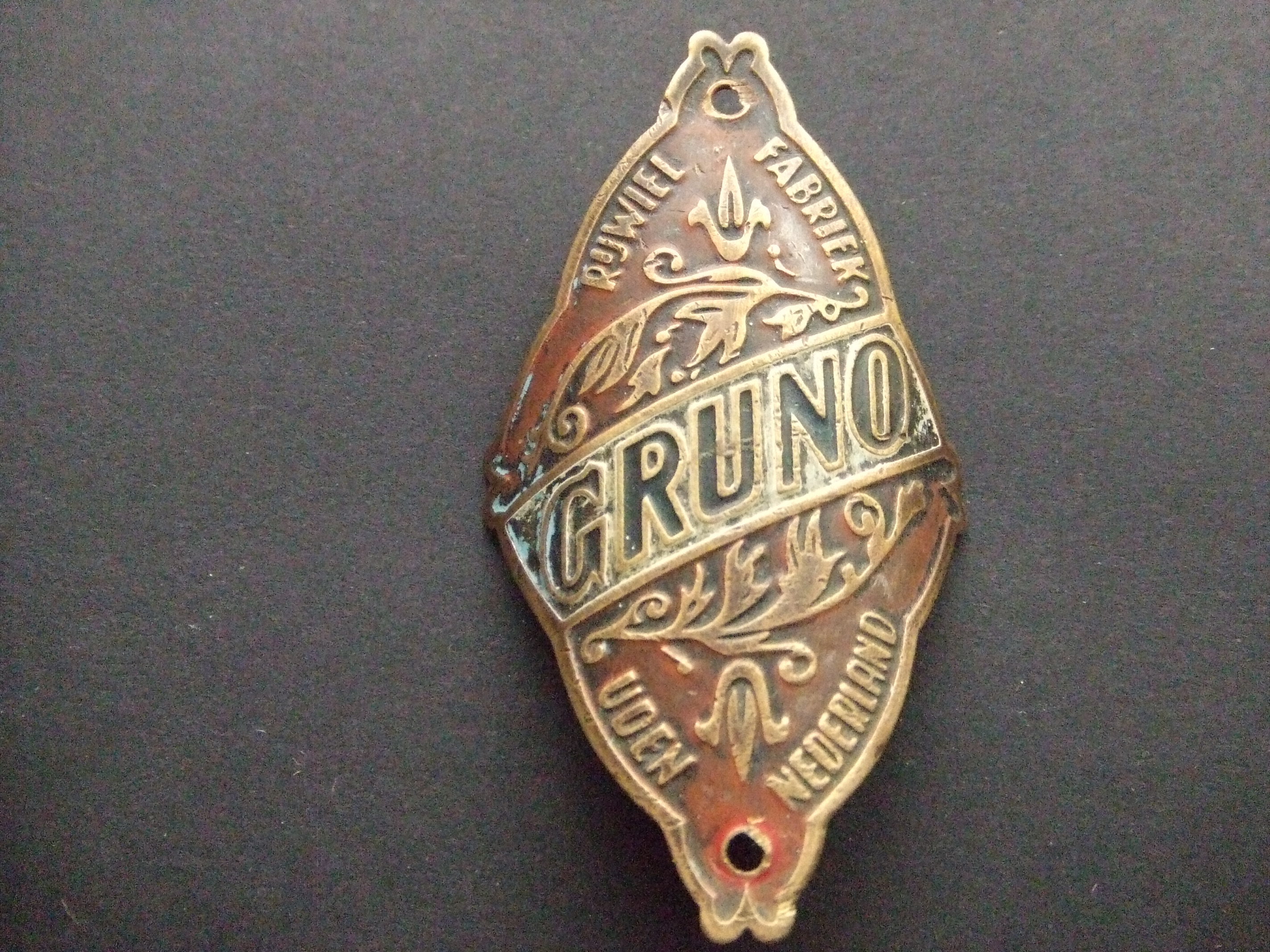Gruno rijwielfabriek Uden oud balhoofdplaatje 10